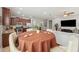 Bright dining area adjacent to the kitchen and living room, perfect for gatherings and entertaining at 11314 American Holly Dr, Riverview, FL 33578
