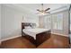 The Primary bedroom includes a tray ceiling, a ceiling fan, and shuttered windows at 11314 American Holly Dr, Riverview, FL 33578