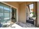 Outdoor patio with tile flooring, sliding glass doors, and views of the screened-in porch at 11314 American Holly Dr, Riverview, FL 33578