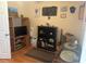 Bedroom with decor, a TV, guitar, and a display of collectible cars at 11814 Washington St, Seffner, FL 33584