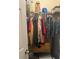 Organized closet with clothing racks, storage shelves, and neatly arranged personal items at 11814 Washington St, Seffner, FL 33584