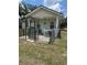Charming single story home with a whimsical fenced courtyard entry at 11814 Washington St, Seffner, FL 33584