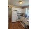 Well-lit kitchen with white appliances and plentiful counter space at 11814 Washington St, Seffner, FL 33584