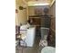 Outdoor laundry area with washer/dryer, seating and decor at 11814 Washington St, Seffner, FL 33584