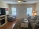 Cozy living room with hardwood floors and neutral decor at 11814 Washington St, Seffner, FL 33584