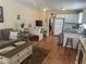 View from the living room through to the kitchen and built-in banquette seating at 11814 Washington St, Seffner, FL 33584