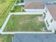 Aerial shot of large backyard with privacy fence, perfect for outdoor activities and gatherings at 11847 Brighton Knoll Loop, Riverview, FL 33579