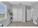 Open office area offers natural light, closet storage, and bright neutral walls at 11847 Brighton Knoll Loop, Riverview, FL 33579