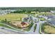 Aerial view of the community playground and recreation area for families to enjoy a vast lawn and outdoor activities at 11847 Brighton Knoll Loop, Riverview, FL 33579