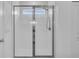 Glass-enclosed shower with showerhead and tile surround provides a clean, modern bathroom space at 11847 Brighton Knoll Loop, Riverview, FL 33579