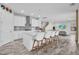 Modern kitchen featuring a center island, stainless steel appliances, and hardwood flooring at 12650 Shetland Walk Dr, Lithia, FL 33547