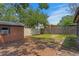 Fenced backyard with shed at 13046 Leverington St, Tampa, FL 33624