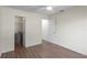 Bedroom with wood-look tile floors and ceiling fan at 13046 Leverington St, Tampa, FL 33624