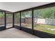 Covered and screened patio featuring a backyard view at 13046 Leverington St, Tampa, FL 33624