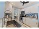 Well-appointed kitchen with stainless steel appliances, granite countertops, and custom tile backsplash at 13168 84Th Ter, Seminole, FL 33776