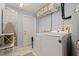 Functional laundry room equipped with modern appliances and ample storage space at 13168 84Th Ter, Seminole, FL 33776