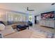 Bright and airy living room with plantation shutters, comfortable seating, and stylish decor at 13168 84Th Ter, Seminole, FL 33776