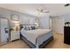 Serene primary bedroom with neutral tones, plantation shutters, and a cozy ambiance at 13168 84Th Ter, Seminole, FL 33776