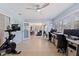 Spacious office with dual desks, a fireplace, and clear views into the dining area at 13168 84Th Ter, Seminole, FL 33776