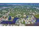 An aerial view of the property and surrounding neighborhood, with waterfront views at 1670 Fox Rd, Clearwater, FL 33764