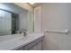 Bright bathroom features a large mirror, spacious counter, and ample storage for everyday needs at 1670 Fox Rd, Clearwater, FL 33764