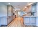 Well-lit kitchen featuring countertops, state-of-the-art appliances, and ample storage space at 1670 Fox Rd, Clearwater, FL 33764