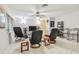 A relaxing living room area with tile floors and comfortable recliner chairs at 17801 Simmons Rd, Lutz, FL 33548