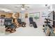 An open concept room with tile floors connects the living area to the kitchen at 17801 Simmons Rd, Lutz, FL 33548