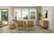 Bright living room offers natural light, stylish decor, and comfortable seating, perfect for relaxation and entertaining guests at 18477 Serene Lake Loop, Lutz, FL 33548