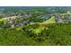 Gorgeous aerial view of community with golf course, ponds and lush green landscaping at 19412 Heritage Harbor, Lutz, FL 33558