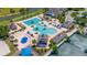 Stunning aerial view of resort style community pool and amenities at 19412 Heritage Harbor, Lutz, FL 33558