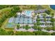 Aerial view of the community pool with tennis and basketball courts at 19412 Heritage Harbor, Lutz, FL 33558