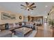 Inviting living room connected to the kitchen, with a comfortable seating area and open layout at 19412 Heritage Harbor, Lutz, FL 33558