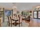 Open concept living and dining area with seamless flow and stylish decor at 19412 Heritage Harbor, Lutz, FL 33558