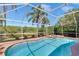 Gorgeous pool with a screened enclosure and peaceful water views at 19412 Heritage Harbor, Lutz, FL 33558