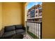 Balcony with seating overlooking city street at 2410 W Azeele St # 214, Tampa, FL 33609