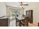 Traditional dining room with hardwood floors, a large window, and classic furniture at 2484 Whitman St, Clearwater, FL 33765