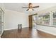 Bright living room features wood floors, and a ceiling fan at 2484 Whitman St, Clearwater, FL 33765