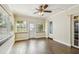 Sun room with tile floor, neutral paint, and many windows at 2484 Whitman St, Clearwater, FL 33765