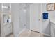 Modern bathroom with glass shower, white cabinets, and a framed mirror at 2781 Dolores Home Ave, Valrico, FL 33594