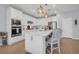 Bright kitchen featuring modern white cabinets, stainless appliances, and a center island with seating at 2781 Dolores Home Ave, Valrico, FL 33594
