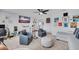 Spacious living area featuring a TV, plush seating, and lots of natural light at 2781 Dolores Home Ave, Valrico, FL 33594