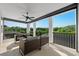 Balcony with two seating areas overlooking private backyard at 28512 Picana Ln, Wesley Chapel, FL 33543