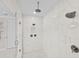 Walk in shower with marble tile, and 3 shower heads at 28512 Picana Ln, Wesley Chapel, FL 33543