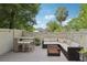 Inviting backyard space with string lights, comfortable seating, and stylish outdoor furniture at 2914 W Gandy Blvd # C, Tampa, FL 33611