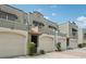 Charming townhouse with a two-car garage, elegant tile roof, and nicely manicured landscaping at 2914 W Gandy Blvd # C, Tampa, FL 33611