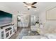 Spacious living room featuring a large sofa, modern decor, and seamless flow into the kitchen at 2914 W Gandy Blvd # C, Tampa, FL 33611