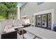 Comfortable patio area with stylish outdoor furniture and string lights at 2914 W Gandy Blvd # C, Tampa, FL 33611