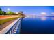 Scenic waterfront view with a tranquil bay, city skyline and pedestrian walkway providing access to the water at 2914 W Gandy Blvd # C, Tampa, FL 33611