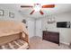 bedroom with tent bed, wood dresser, and neutral tones, offering a cozy and functional space at 316 Jenkins Ave, Brooksville, FL 34604